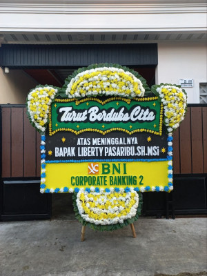 Papan Bunga Duka di Mulia