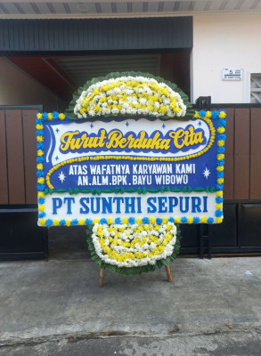 Papan Bunga Duka di Mulia