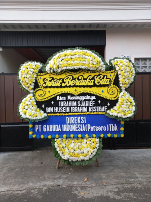 Papan Bunga Duka di Mulia