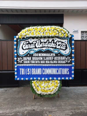 Papan Bunga Duka di Mulia